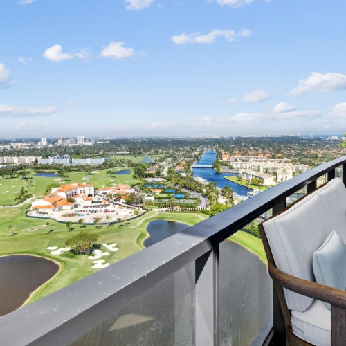Spacious balconies a view of a city from a balcony