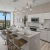 a kitchen with white cabinets