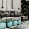 a room with a shelf of cattle bells and medicine balls