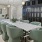 a dining room with a table and chairs