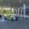 a couple of cars parked outside a building